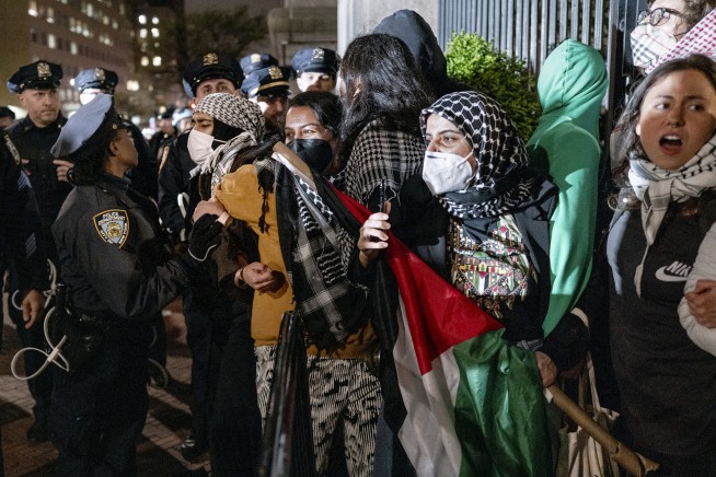 Columbia University says it expelled some students who seized building last year