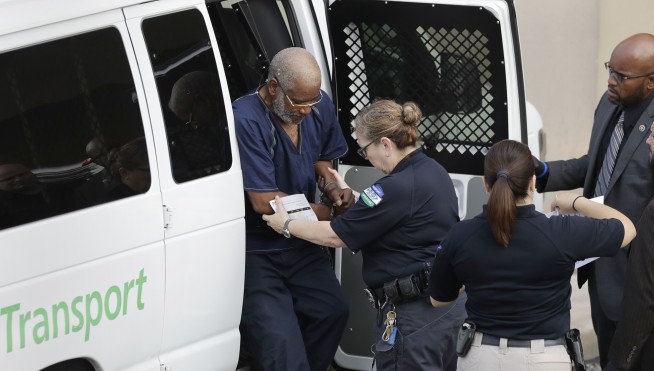 The Latest: Truck driver charged with human trafficking