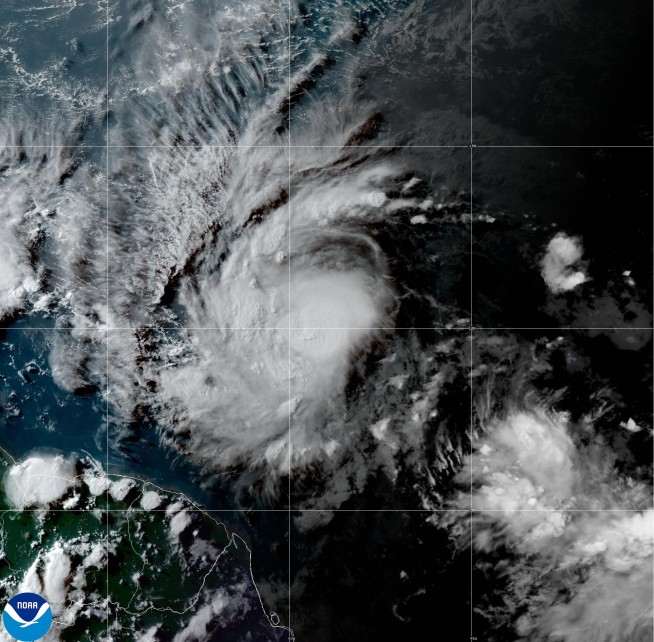 Beryl strengthens into hurricane in Atlantic, forecast to grow into major storm entering Caribbean