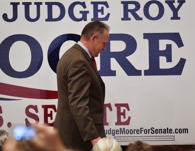 The Latest: Moore not conceding Senate race to Jones