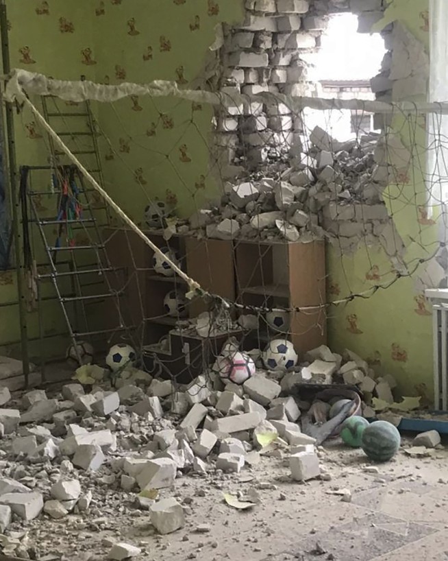 In Ukraine's volatile east, a day of shelling, outages, fear