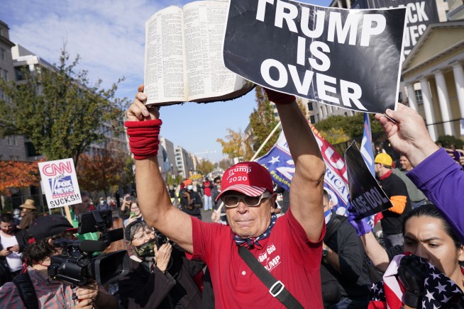 Trump hails progress on vaccine in first remarks since loss