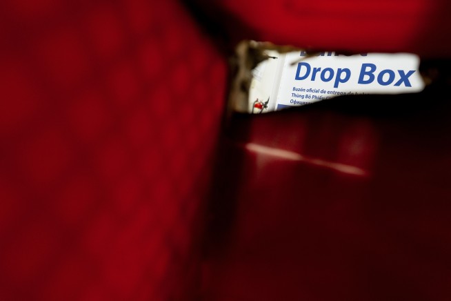 Fires set in drop boxes destroy hundreds of ballots in Washington and damage 3 in Oregon