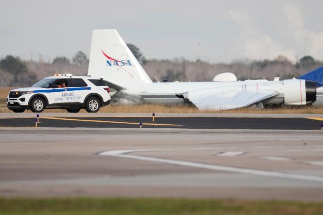 Video shows flames flying from NASA plane that touched down without landing gear