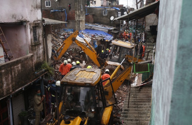 Building collapse kills 11 after monsoon flooding in Mumbai