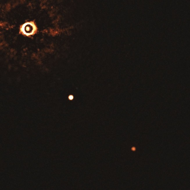 Telescope snaps family portrait of 2 planets around baby sun