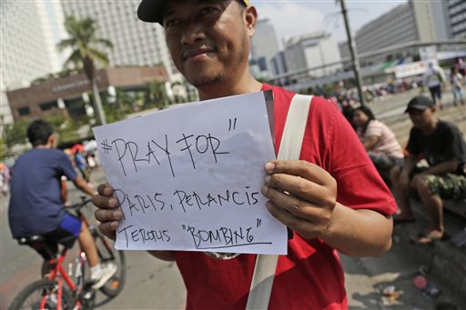 The Latest: Syrian passport in Paris traveled Balkans route