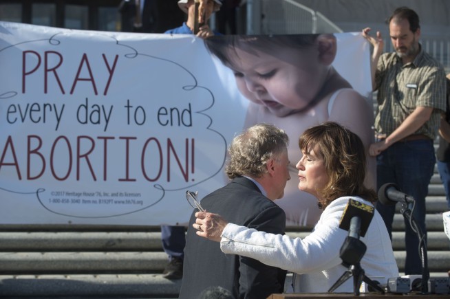 Louisiana's Democratic governor signs abortion ban into law