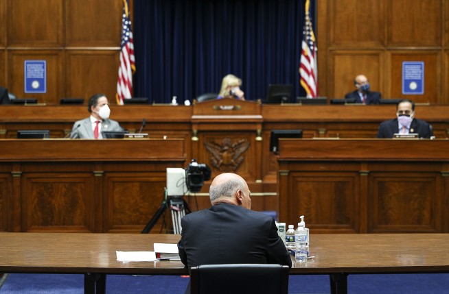 Postal leader defends changes, denies 'sabotaging' election