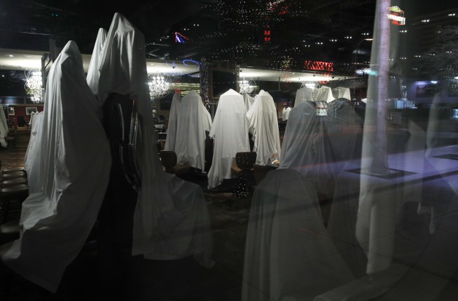 Muted and vacant, Las Vegas struggles to survive shutdown