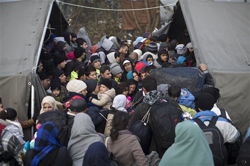 The Latest: Berlin builds temporary shelter at old airport