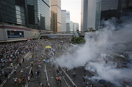 HK police use tear gas to try to clear protesters