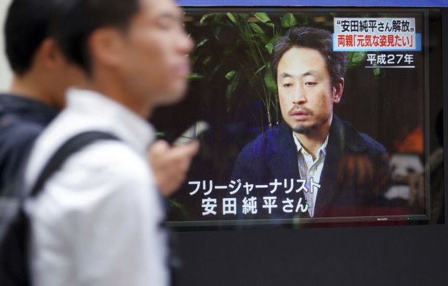 Japan journalist freed from Syrian captivity says he's safe