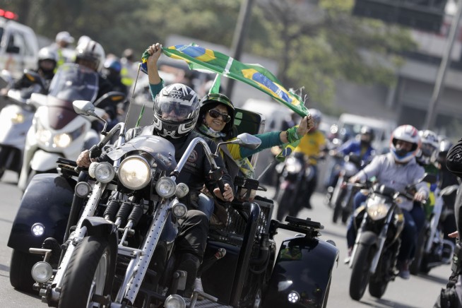 Bolsonaro fined for flouting mask order at motorcycle rally