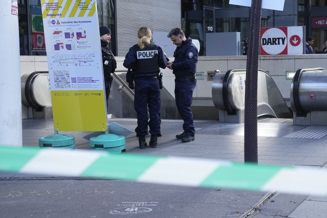 Paris police open fire on a woman who allegedly made death threats in the latest security incident