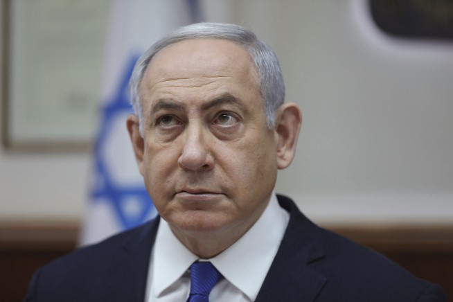 Israel PM seeks immunity, buying time until after vote