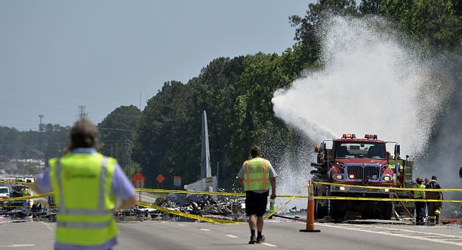 The Latest: Trump tweets thoughts, prayers for crash victims