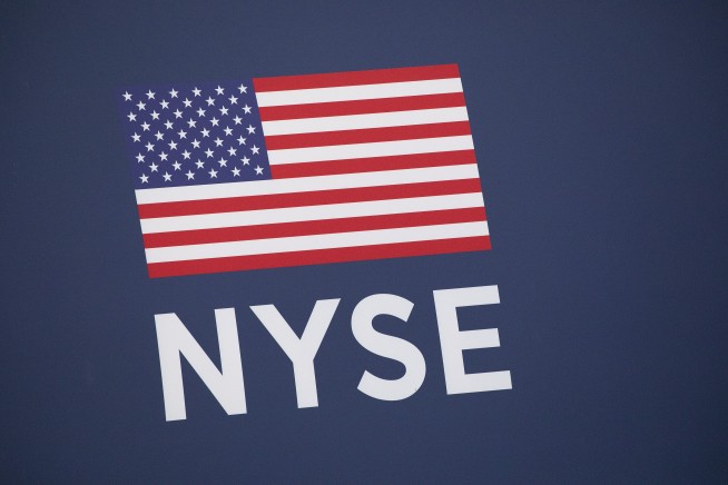 Stocks swing as Wall Street's tumultuous week comes to close