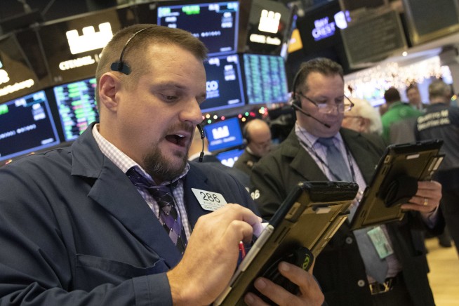 Markets Right Now: Stock market ends mixed after a bumpy day