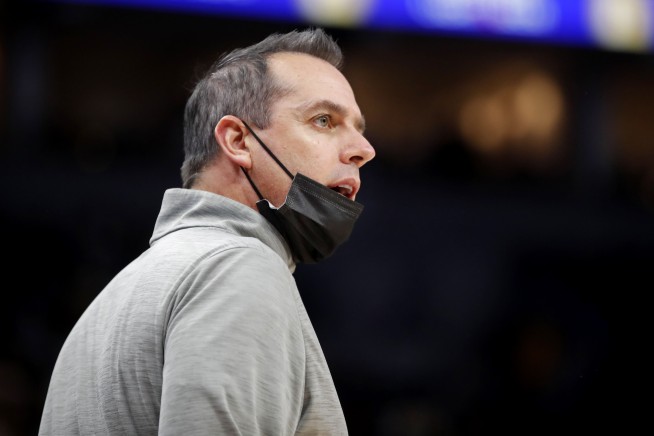 NBA postpones 5 more games; Young, Vogel enter protocols