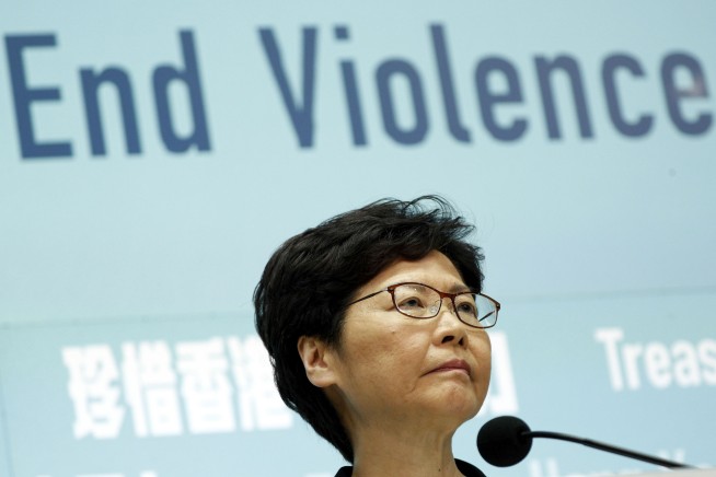 Hong Kong leader bans masks in hardening stance on protests