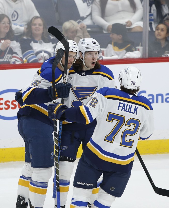 Connor’s late goal fuels Jets to 5-3 win over Blues in playoff opener