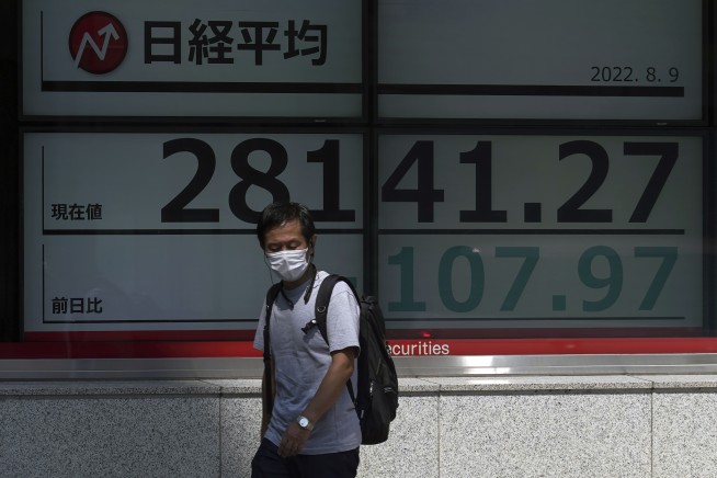 Wall Street slips as weak earnings hit tech, travel stocks