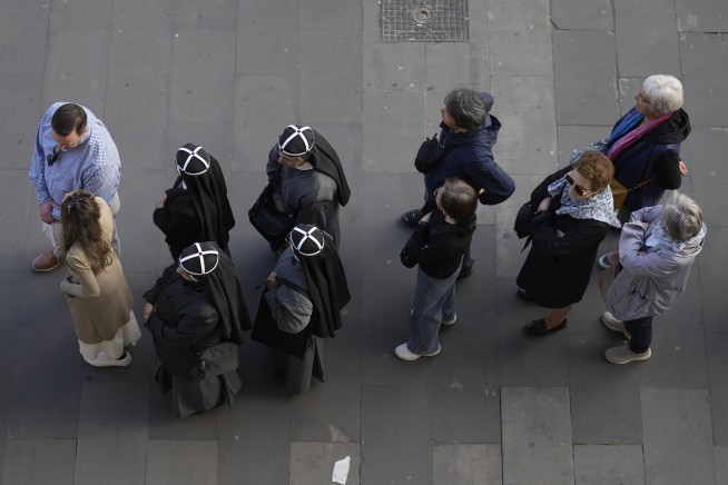 Tens of thousands file into St. Peter's Basilica to pay final respects to Pope Francis