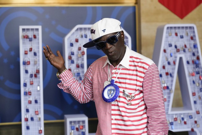 Flavor Flav is soaking up his 1st Olympic experience cheering on the US water polo teams