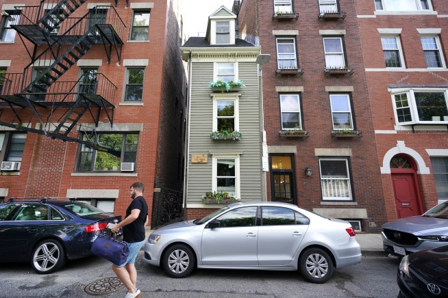 Boston's famous Skinny House sells for a nice fat price