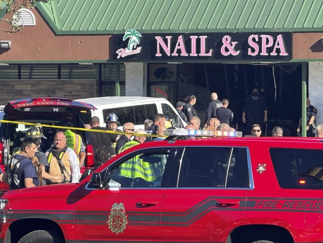 Minivan slams into a Long Island nail salon, killing 4 and injuring 9, official says