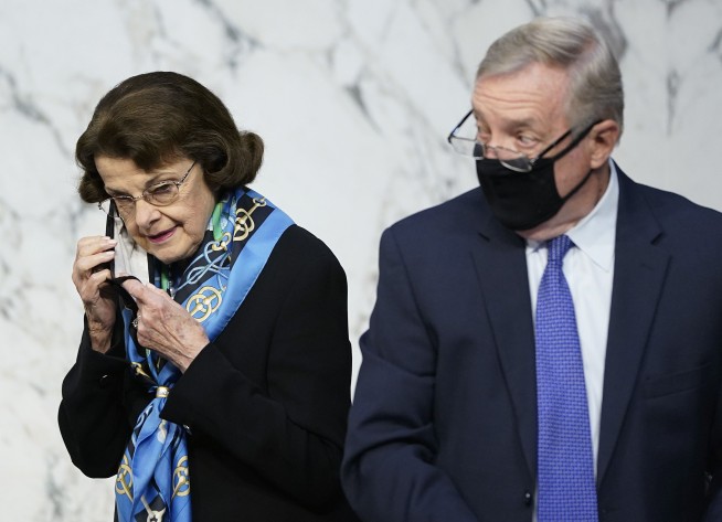 Barrett keeps Democrats, Trump at bay in Senate hearing