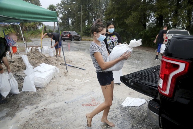 Tropical Storm Eta dumps blustery rain on Florida west coast