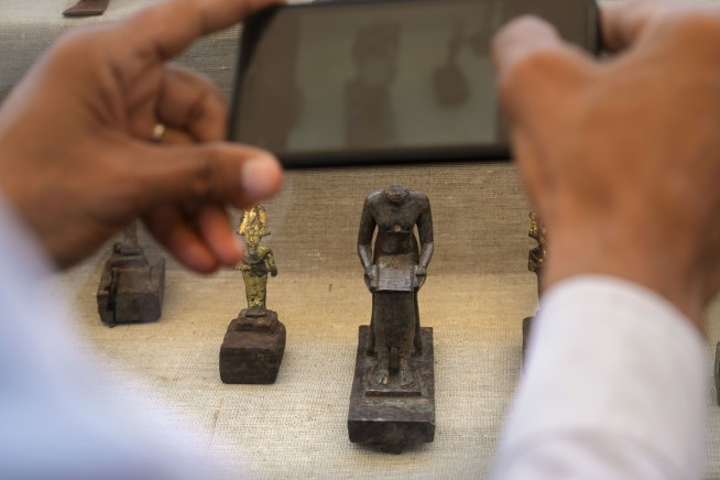 Egypt displays trove of newly discovered ancient artifacts