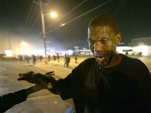 Police, protesters collide again in Ferguson