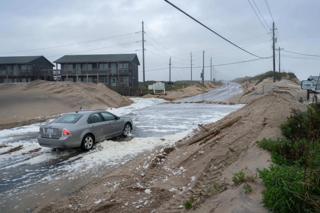 New Jersey declares emergency as nor'easter approaches, while Alaska flooding carries away homes