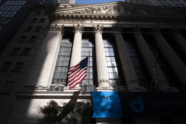 Wall Street retreats with global markets as rally fades