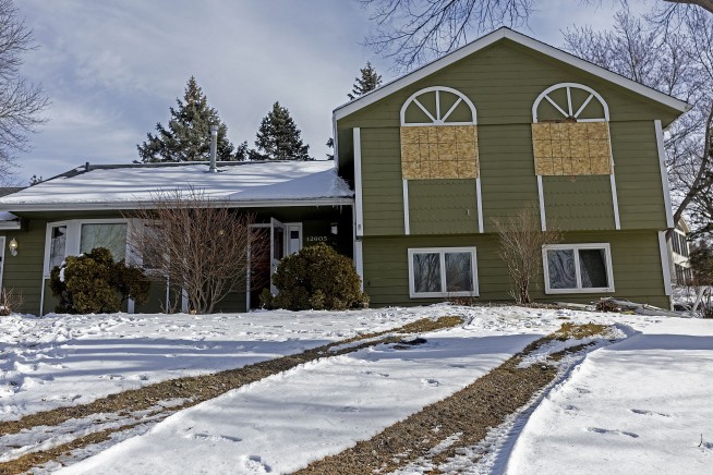 A shaken Minnesota community gets some answers on the killings of 2 officers and 1 firefighter