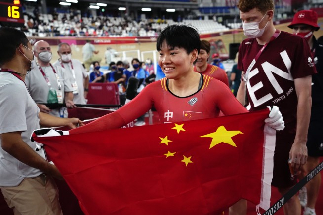Mao pins worn by Chinese athletes may test Olympic rules
