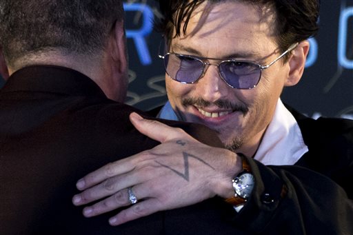 Engaged Johnny Depp shows off 'chick's ring'