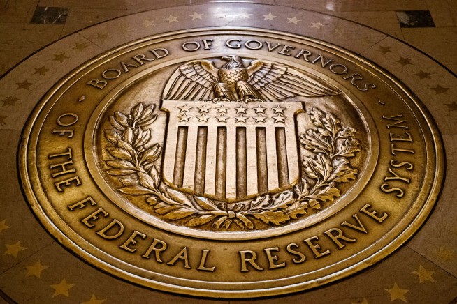 Fed ramps up lending, bond buying to calm financial markets