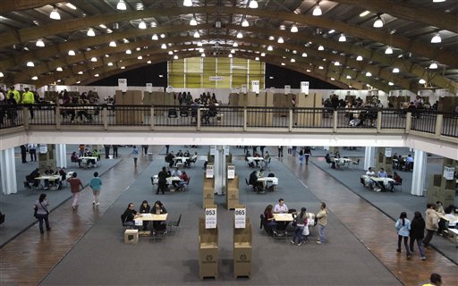 Santos re-elected Colombia president in peace vote