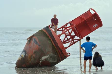 Big red buoy missing for 2 years beached in Florida