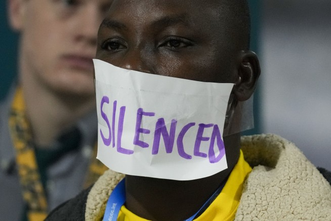 Protesters gather at UN climate talks in global day of action as progress on a deal slows