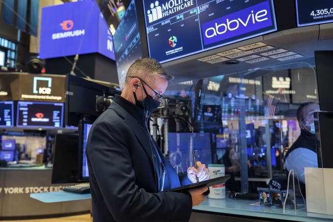 Stocks pull mostly higher, shaking off some early wobbles