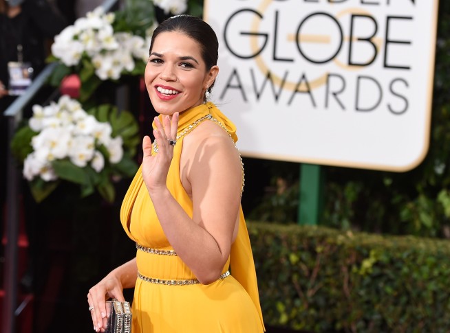 Winter whites, pops of yellow on the Golden Globes carpet