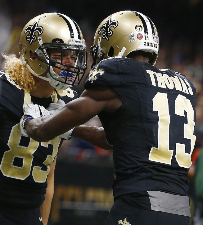 Blocked point-after kick lifts Broncos past Saints, 25-23