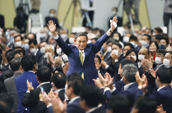 Suga wins party vote, all but assuring election as Japan PM