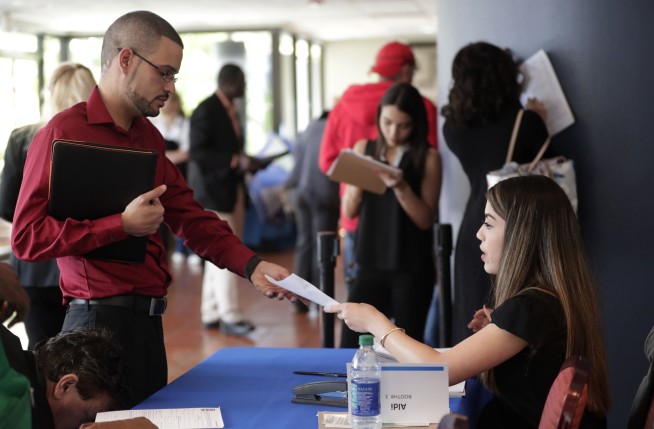 US added modest 103K jobs in March; rate stays 4.1 pct.