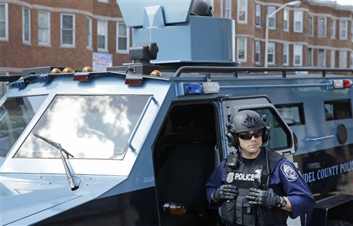 Latest on police-custody death: Protesters march in city